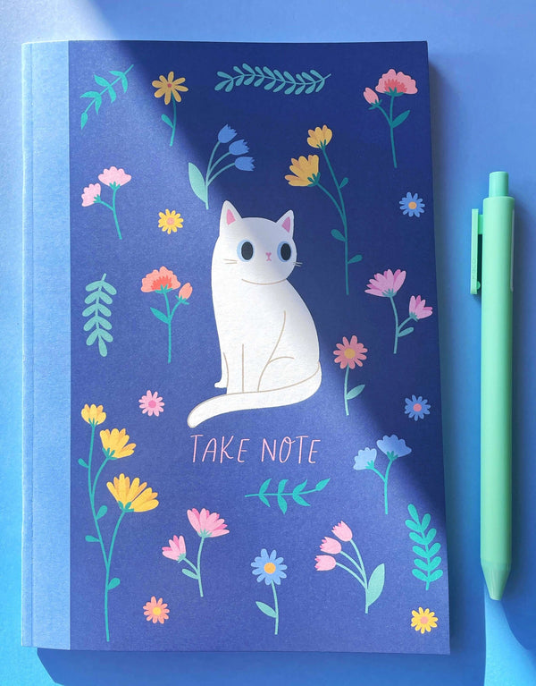 cat in wildflowers notebook